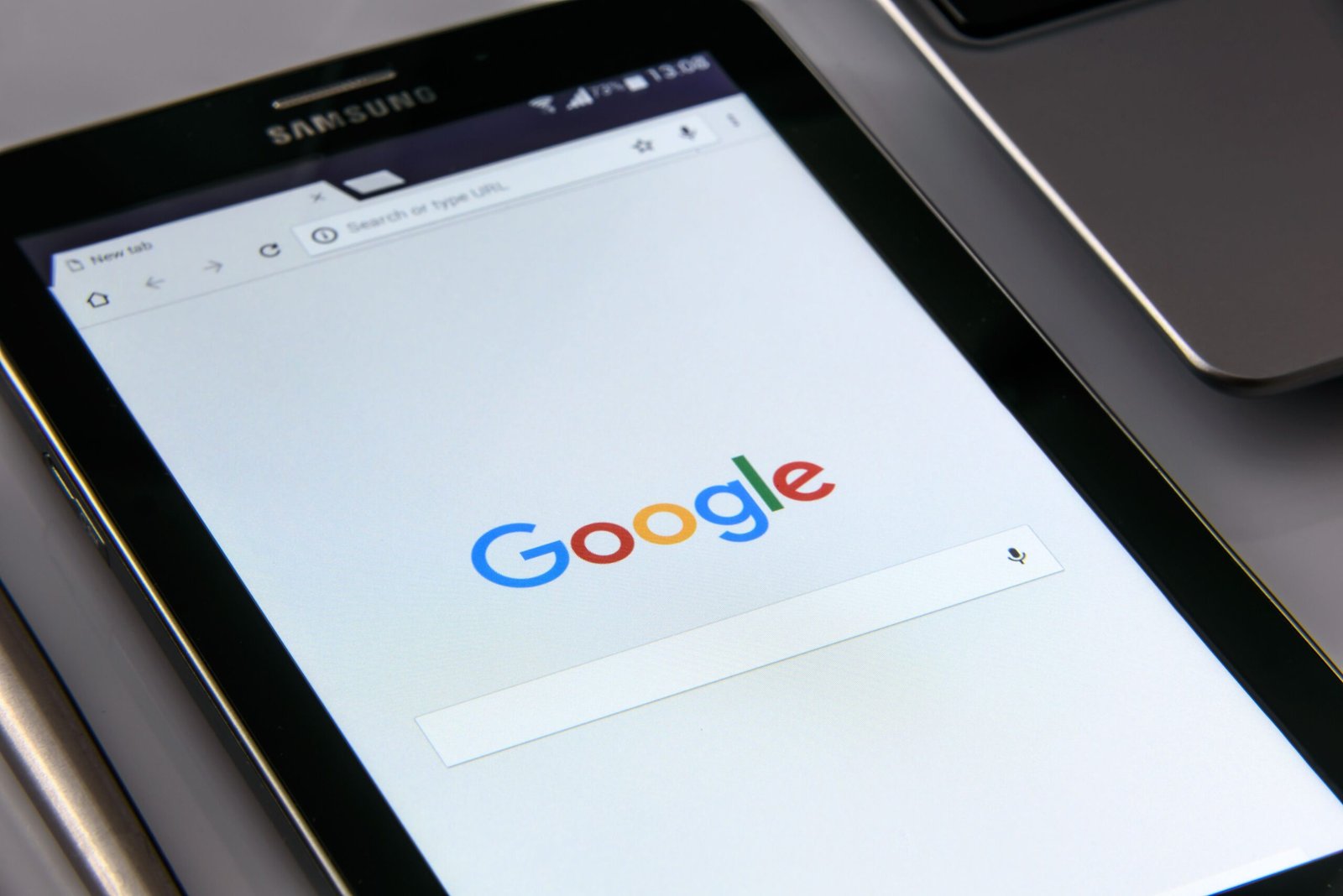 Smartphone displaying Google search for mobile search visibility and SEO.